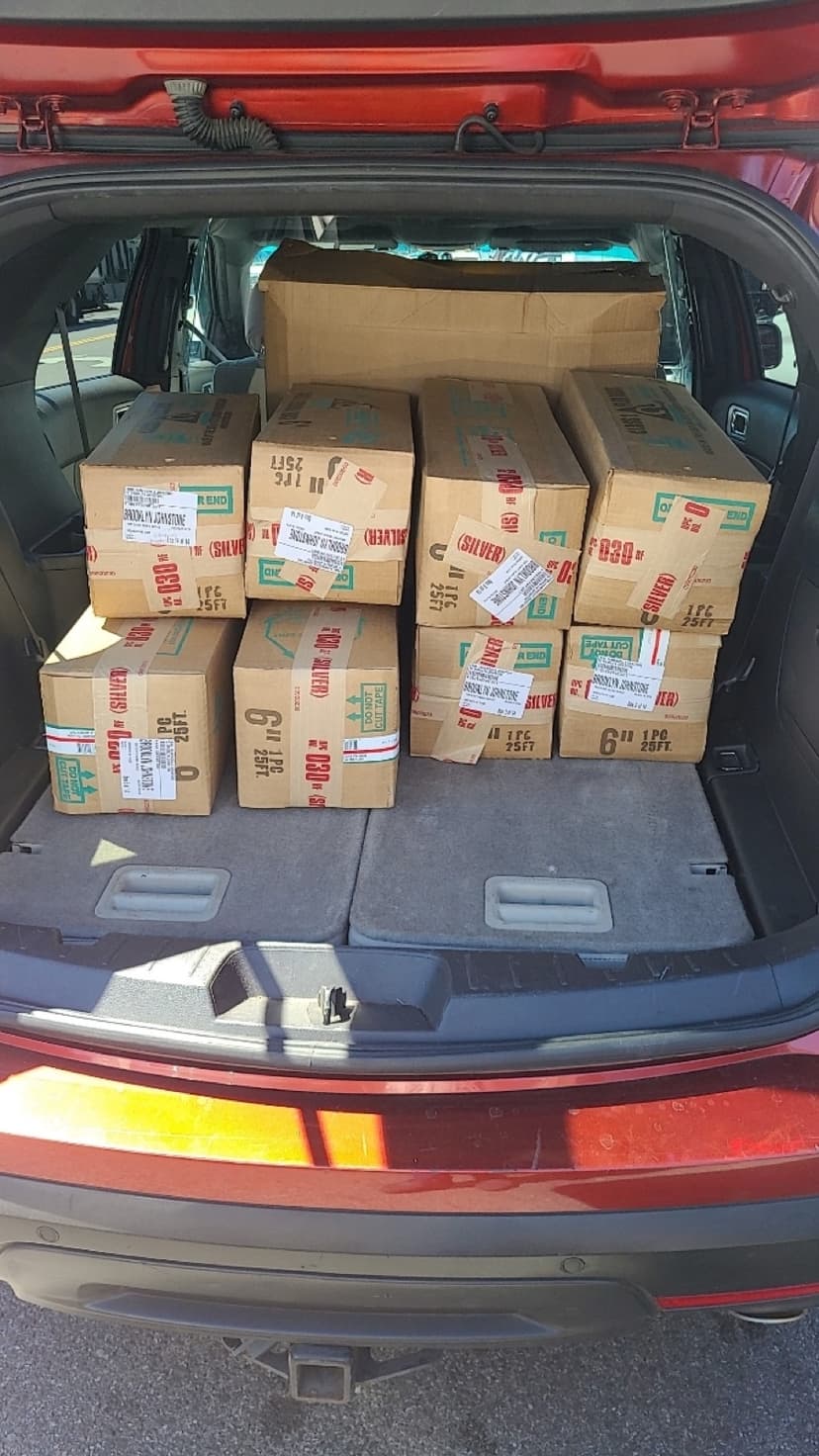 Curri car courier delivering documents and small packages to a downtown business