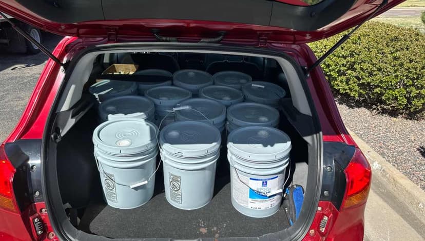 Small light-duty cargo loaded in a sedan trunk for a Curri delivery
